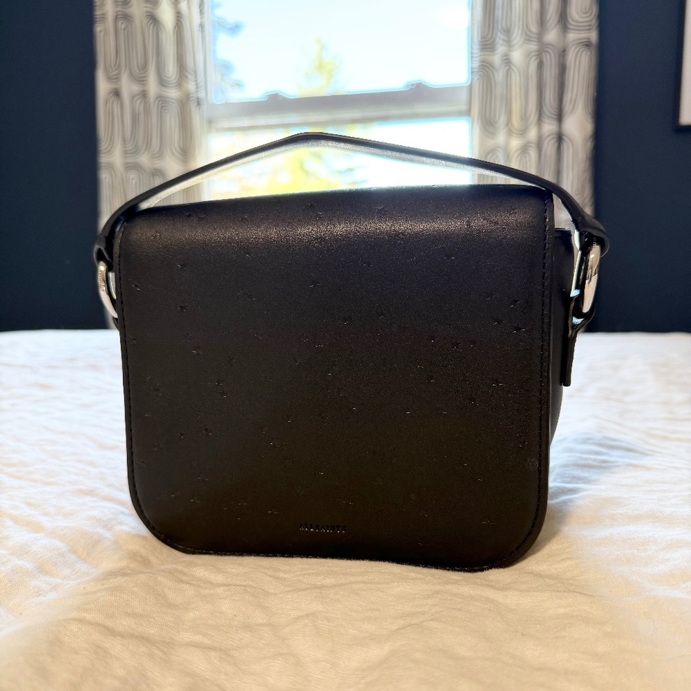 All Saints Black Embossed Star Clutch